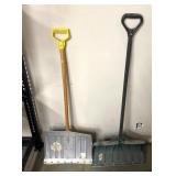 Plastic and metal snow shovels
