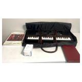 Casio keyboard - sheet music & AC adapter