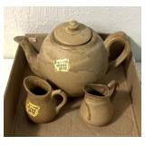 vintage ceramic set includes a teapot and two