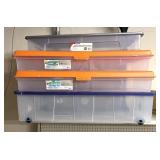 4 large clear storage containers