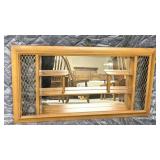 vintage wooden mirror with integrated shelving,
