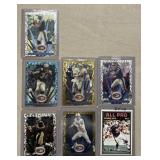Seven football cards