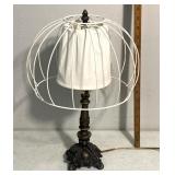 vintage-style table lamp featuring an ornate,