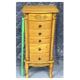 standing oak jewelry armoire featuring multiple