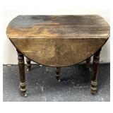 Vintage wooden dropleaf table some paint on top