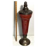 vintage oxblood red and brass-colored ceramic