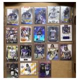 17 sleeve Vikings football cards + other