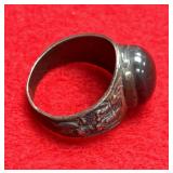 antique Thai magic ring featuring a dark