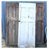 3 primitive wooden doors