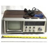 Miniature radio/TV/weather combo unit Powers on
