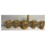 rattan- or wicker-wrapped clear glass tumblers