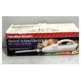 Swivel action, electric knife
