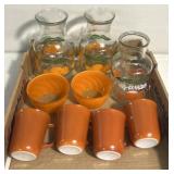 Orange themed decor - pyrex/retro juice pitchers