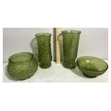Green glassware bowls, vases