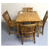 Wooden dining room table w/4 matching chairs