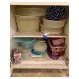 Plastic Dishes in Lower Cabinet