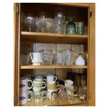 MISc Glasses Mugs in Upper Cabinet Right of Sink