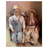Porcelain Elderly Couple Dolls on Wood Bench