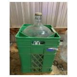 5 Gallon Glass Water Bottle in Plastic Crate