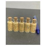 (5) Small Tubes of Gold Flakes (stock photo)
