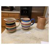 (3) Ceramic Pitchers