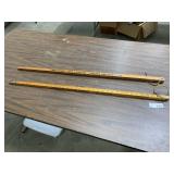 (2) Square Yard Sticks Advertisement