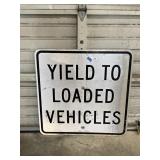 Retired Road Sign "Yield TO Loaded Vehicles"