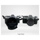 Pair of  Canon AE-1 35mm SLR Cameras & Lenses