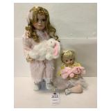 2 Ceramic Easter Girls Dolls Holding Bunny as Baby