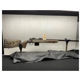 Mossberg Bolt-Action Rifle with Laminated Stock