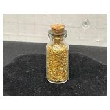 Small Glass Bottle with Gold-Colored Flakes