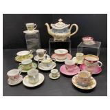Collection of Teacups, Saucers, and Teapot
