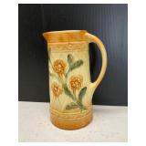 Floral Ceramic Pitcher With Yellow Glaze