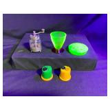 Collection of Decorative Items and Grinder