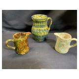 Set of Three Spatterware Pitchers
