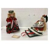 Two Christmas Porcelain Dolls