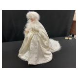 Porcelain Doll in White Gown