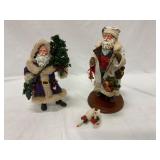 Two Santa Figures With Accessories