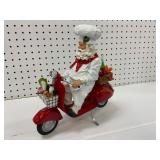 Santa Chef Figure on Red Scooter