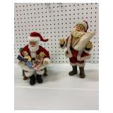 Two Santa Claus Figurines