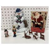 Cast Iron Santa and Snowman Figurines