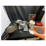 Six Placemats and Cookware