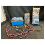 Battery Charger, Fire Extinguisher, and Bungee Net