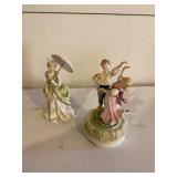 Two Ceramic Figurines with Musical Base