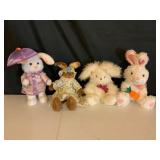 Four Plush Bunny Figures