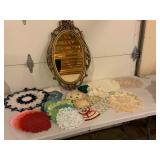 Crocheted Doilies and Ornate Mirror