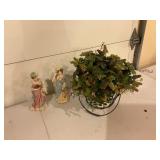 Porcelain Figurines and Faux Floral Decor