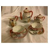 Japanese Porcelain Tea Set with Hand-Painted Scene