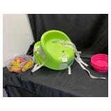Green Plastic Booster Seats and Toys