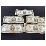 Five $2 Federal Reserve Notes